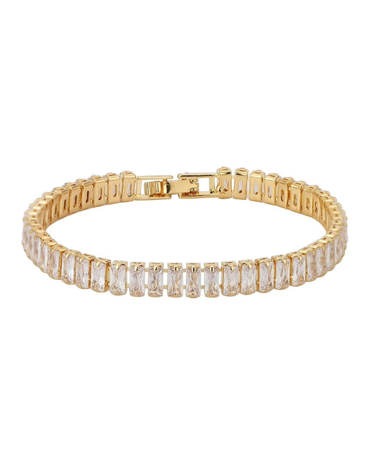 Gold bracelet with clear gemstones on a white background
