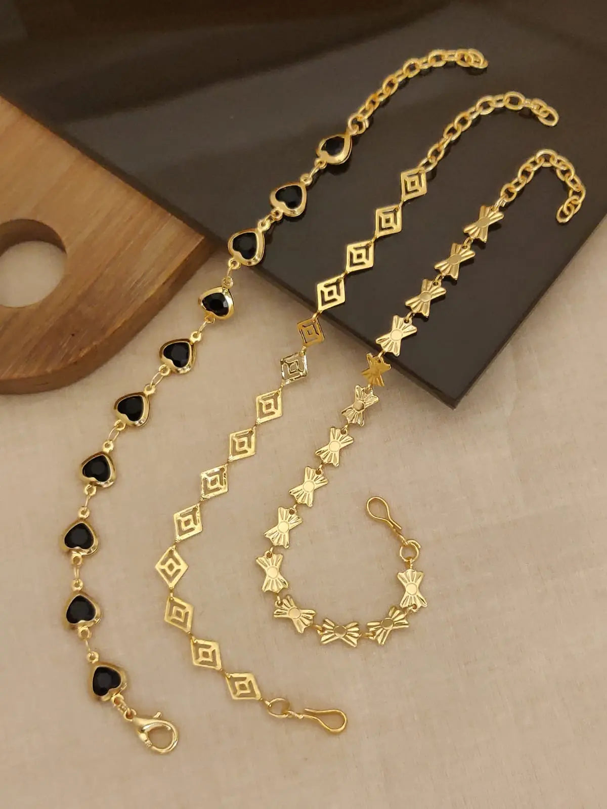 Golden Noir Charm Bracelet Trio Aureva