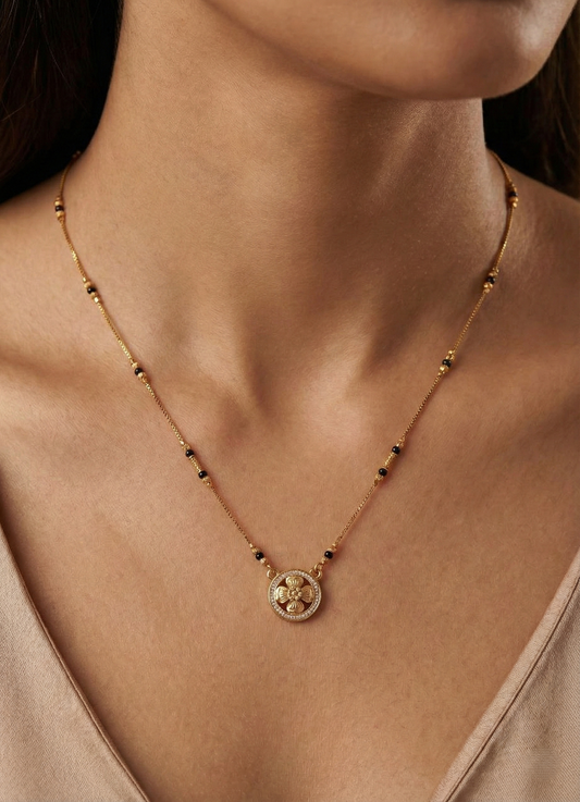 Necklace with a pendant on a person's neck