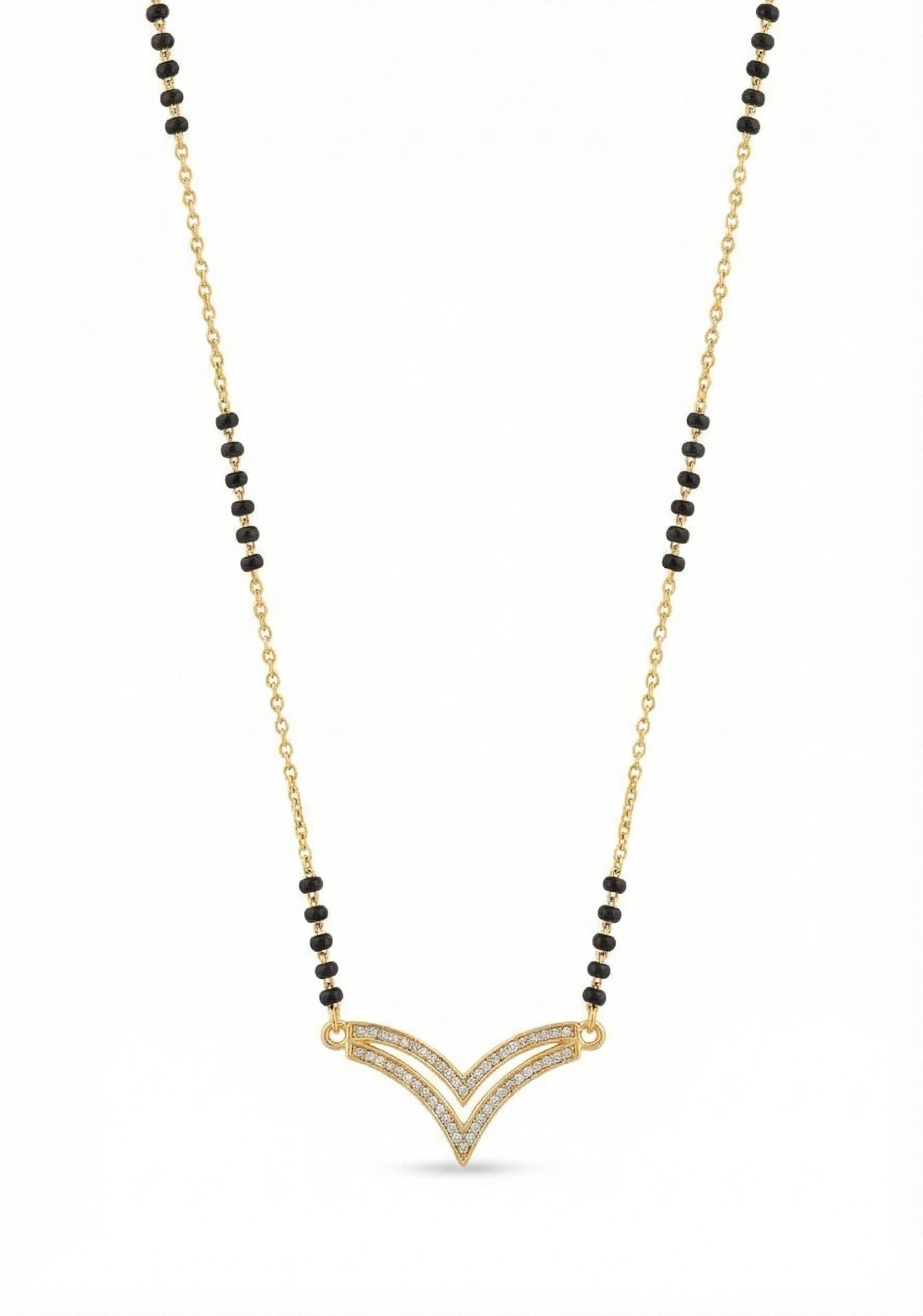 Necklace with gold pendant and black beads on a white background