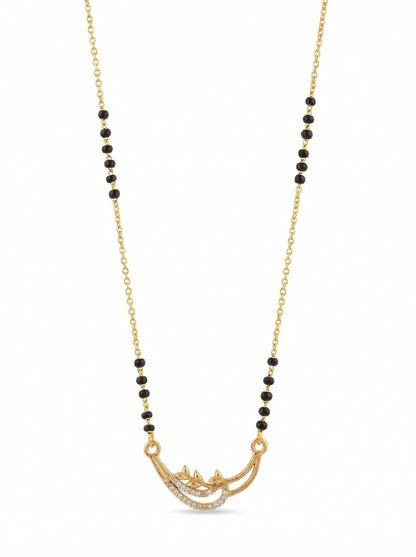 Necklace with black beads and gold chain on a white background